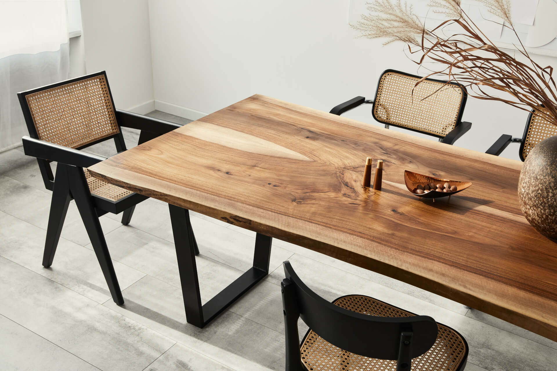 Interior design of stylish dining room interior, wooden table