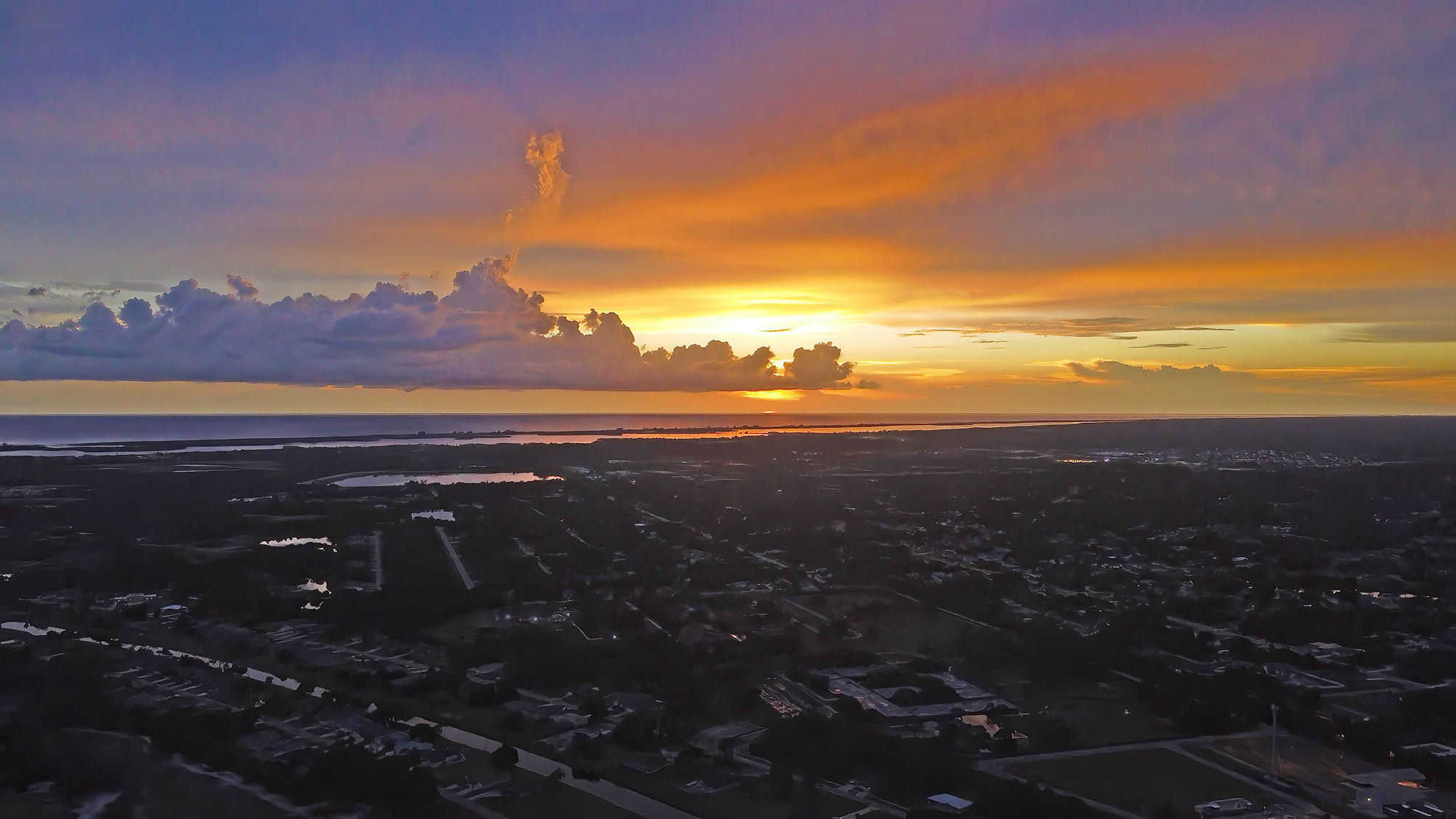 Sunset over Rotonda West and the Gulf of Mexico in the distance