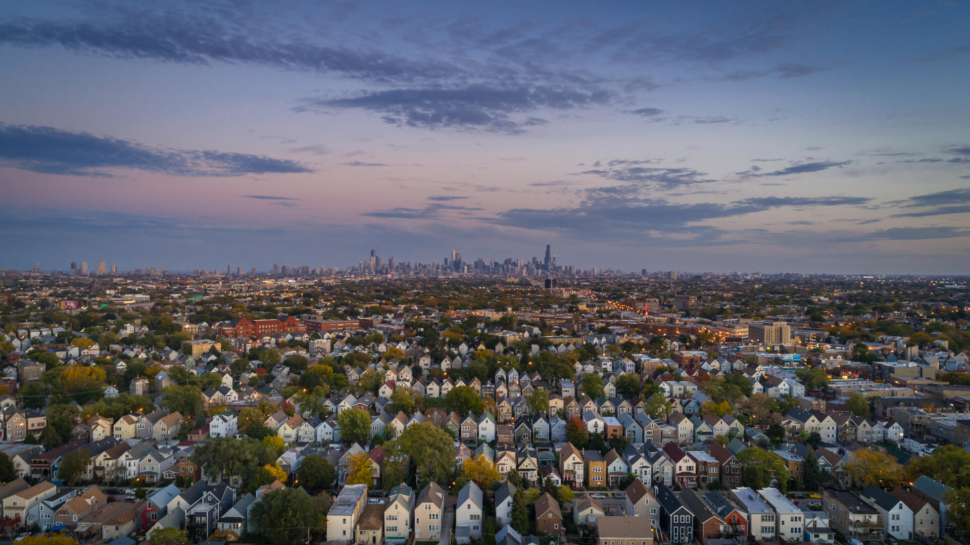 Chicago suburbs, after sunset, overlooking downtown