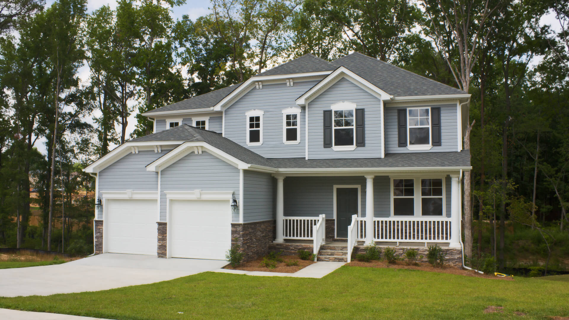 arge, upscale, two story gray home