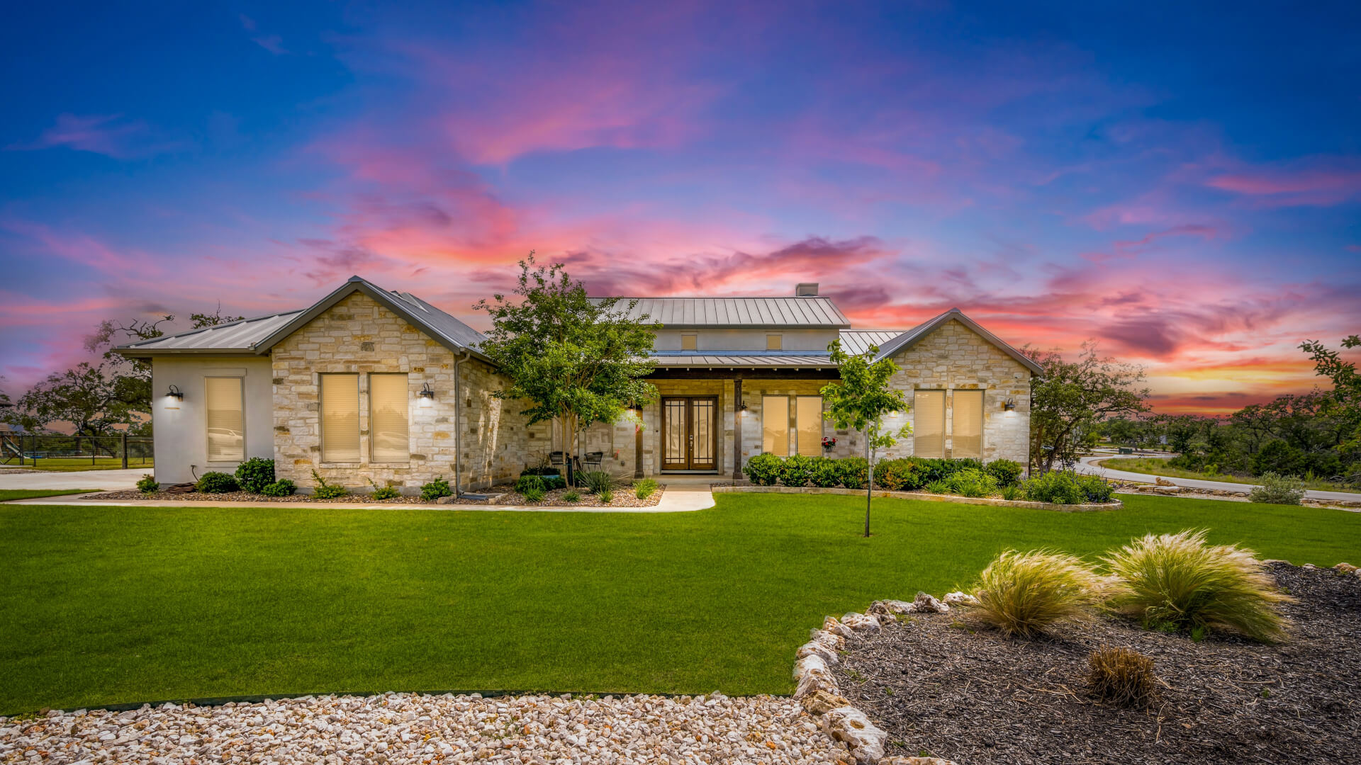 a beautiful home at sunset