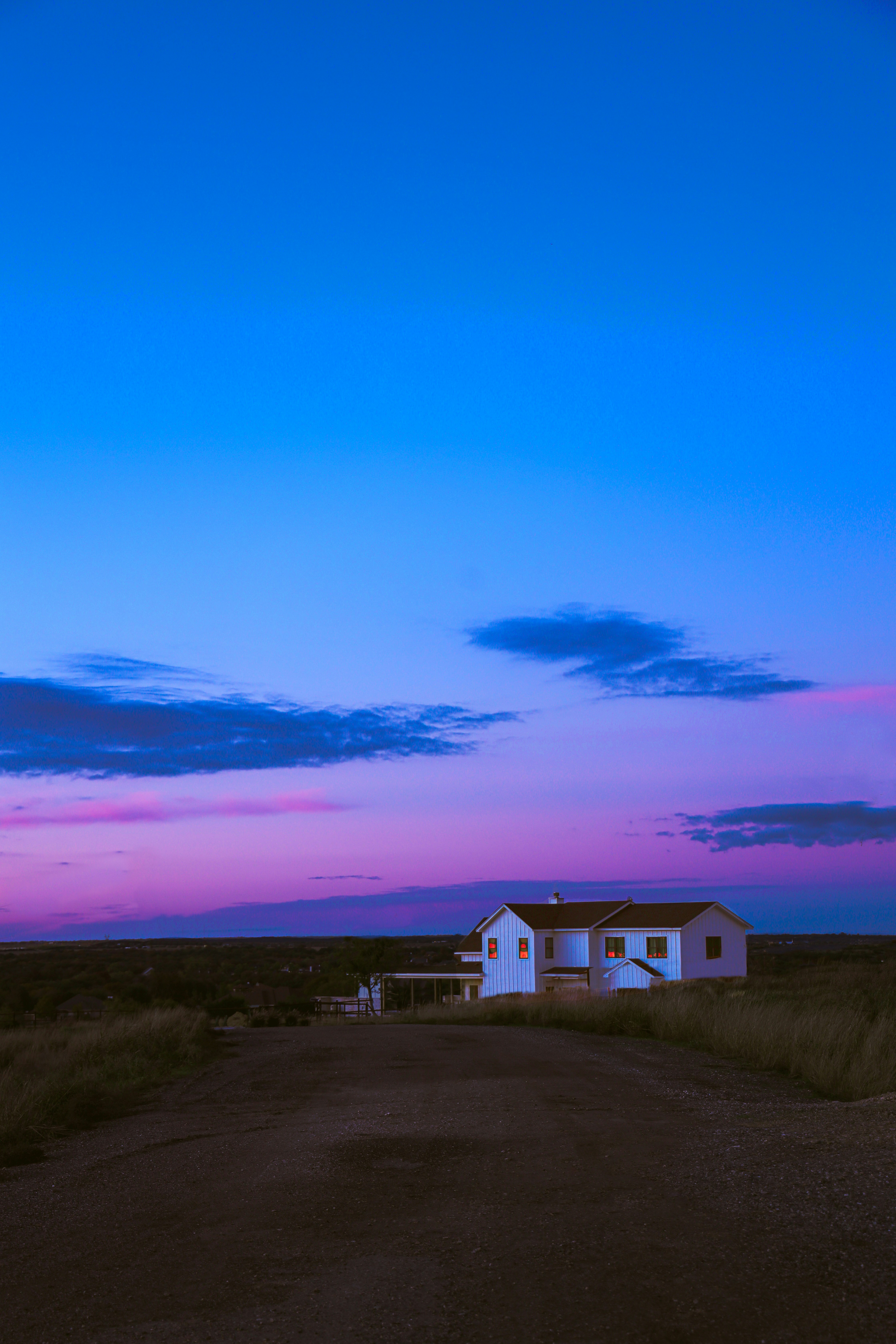 Texas home at sunset on a rural road