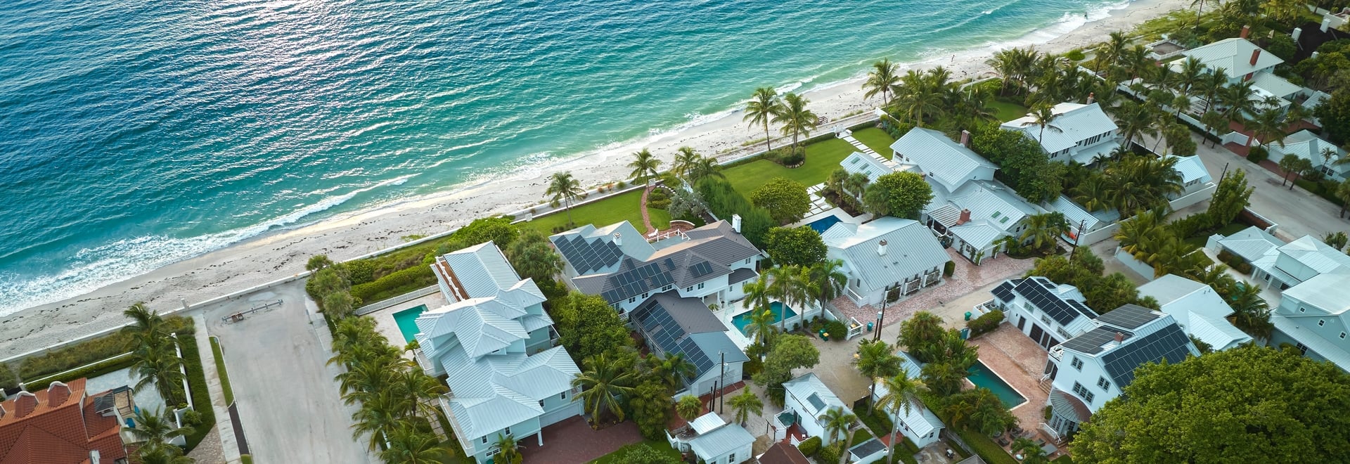 Aerial,View,Of,Expensive,Residential,Houses,In,Island,Small,Town