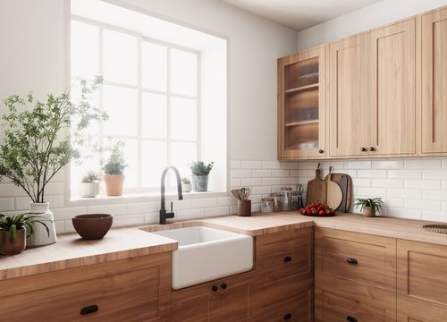 A,Warm,And,Cozy,Kitchen,That,Features,Beautiful,Wood,Cabinets,