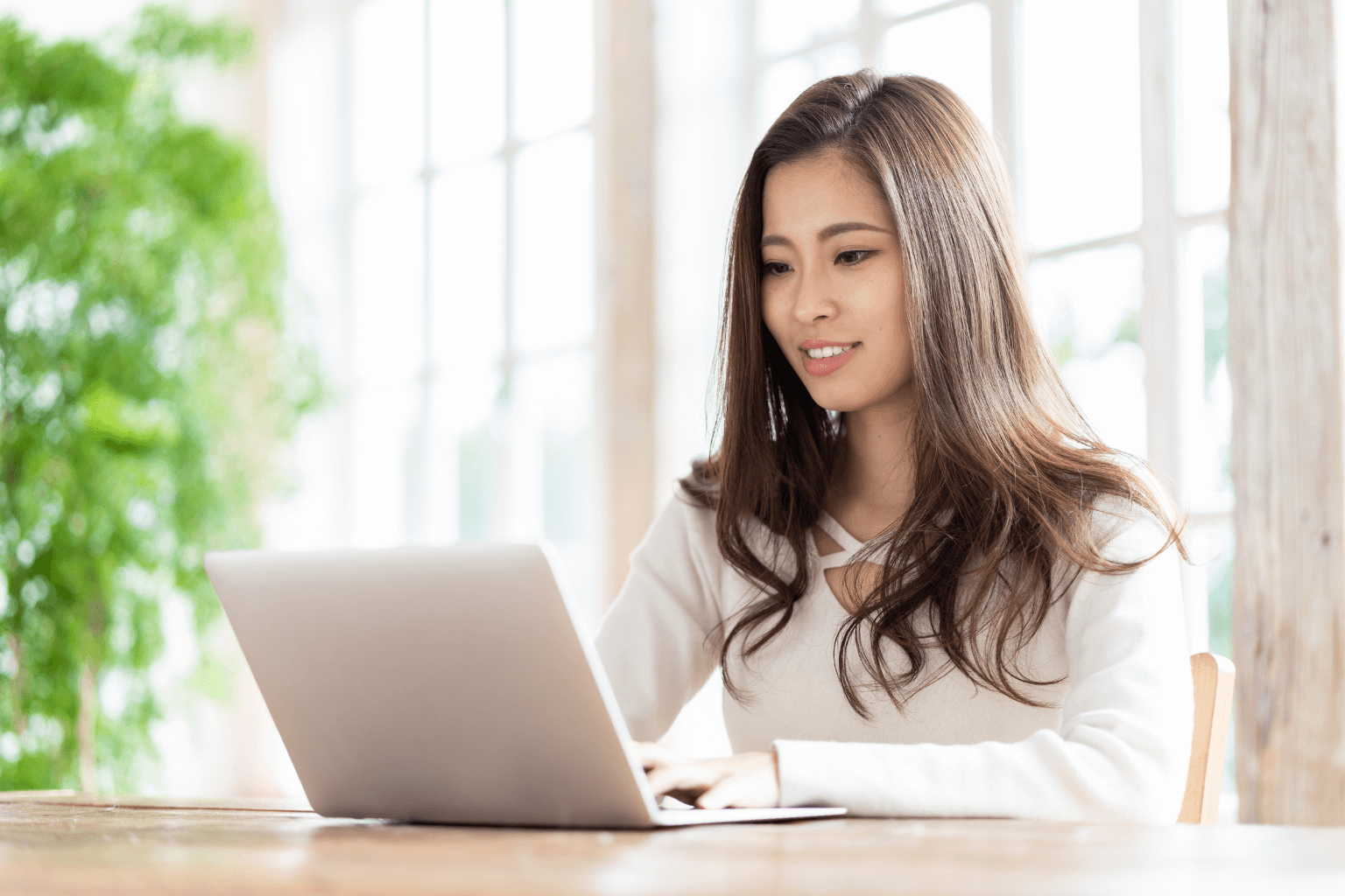 Person researching mortgage rate options on a laptop