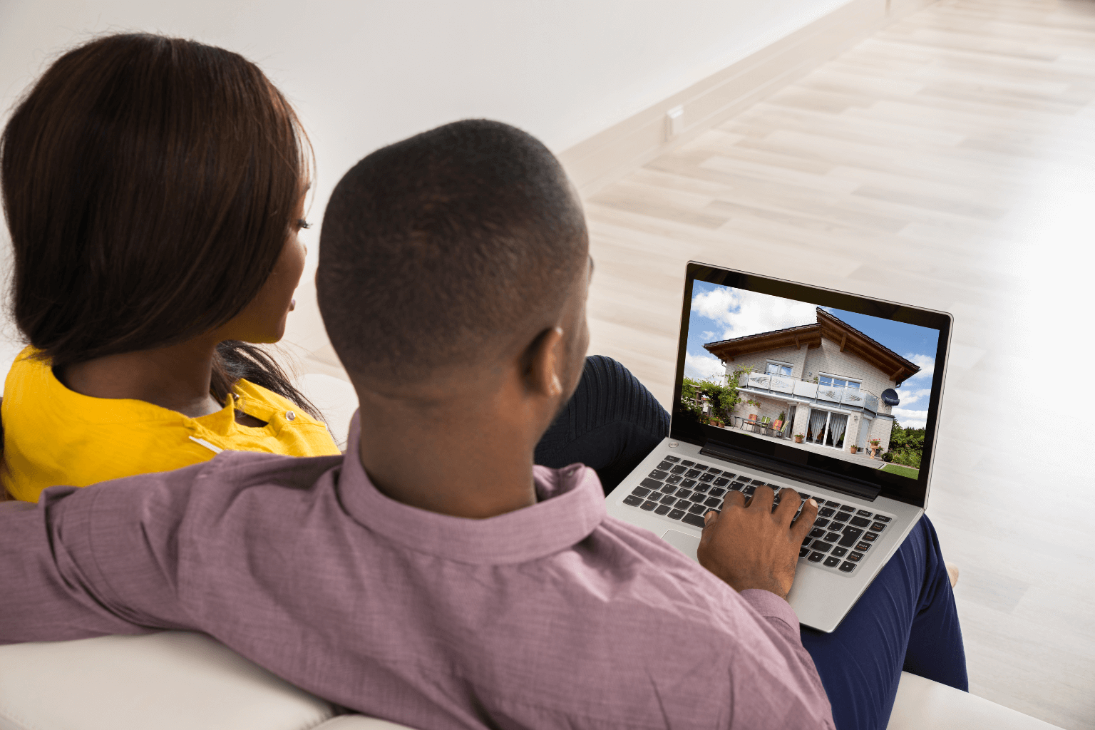 First-time homebuyer couple reviewing home listings in Concord