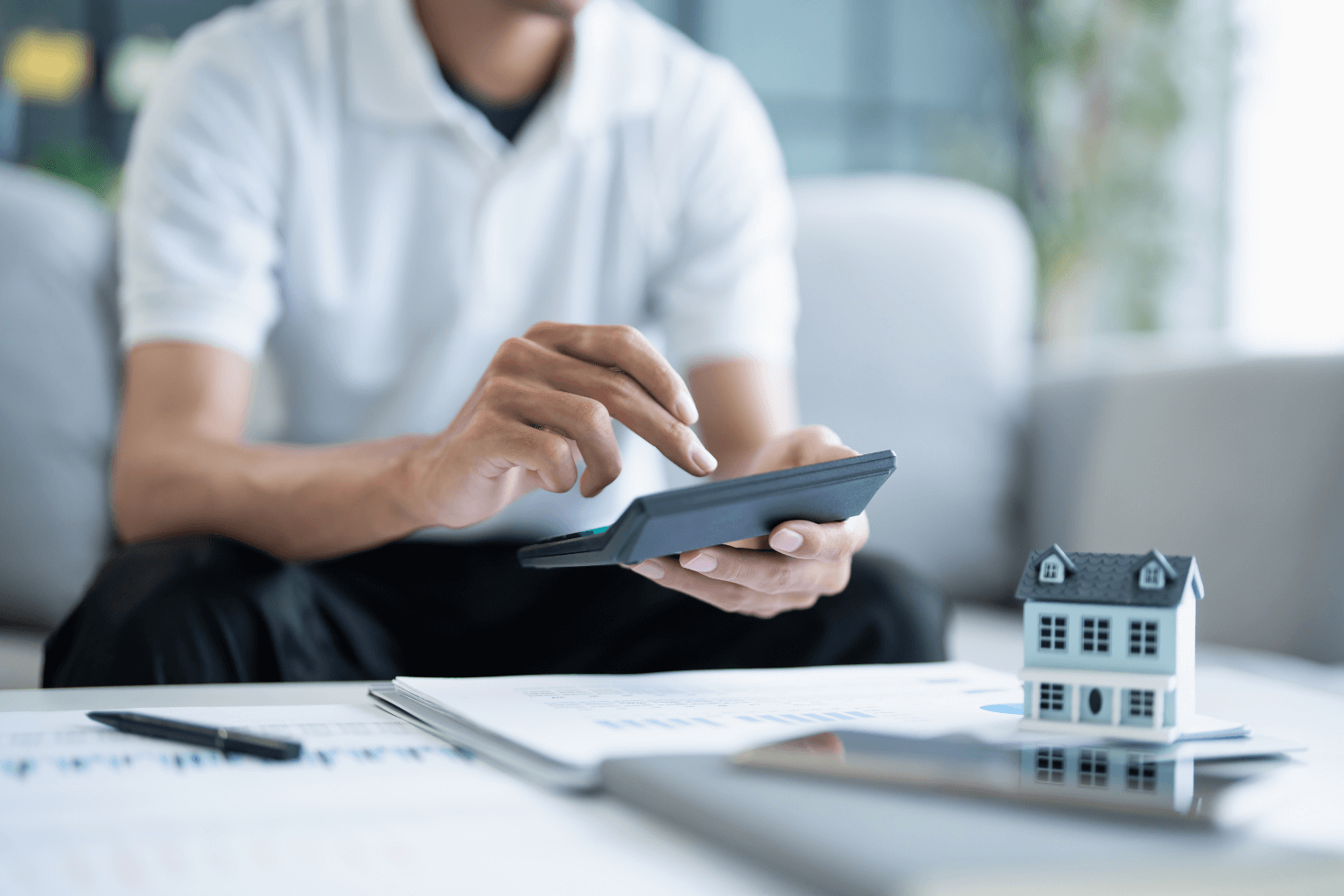 Calculating total homeownership costs using bills and a calculator