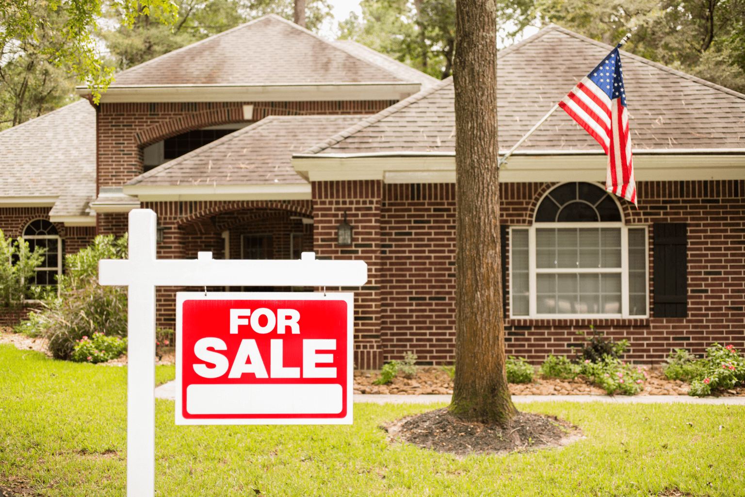 House for sale sign in front yard in Concord California.