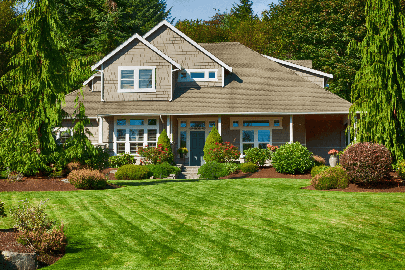 Front yard with fresh landscaping and flowers