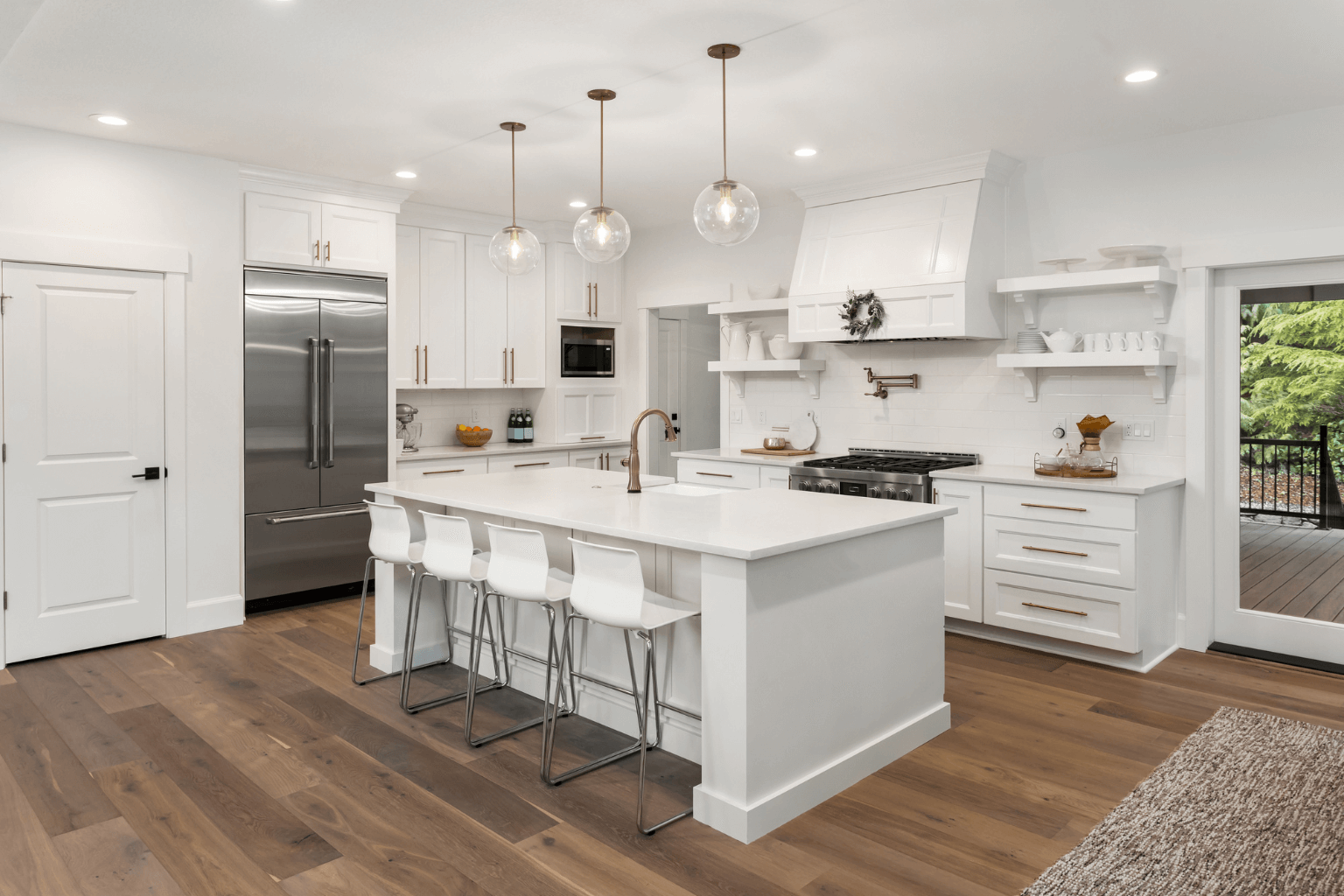 Organized kitchen with clean counters and fruit bowl