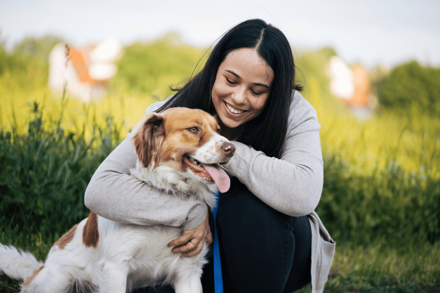 happy dog with owner