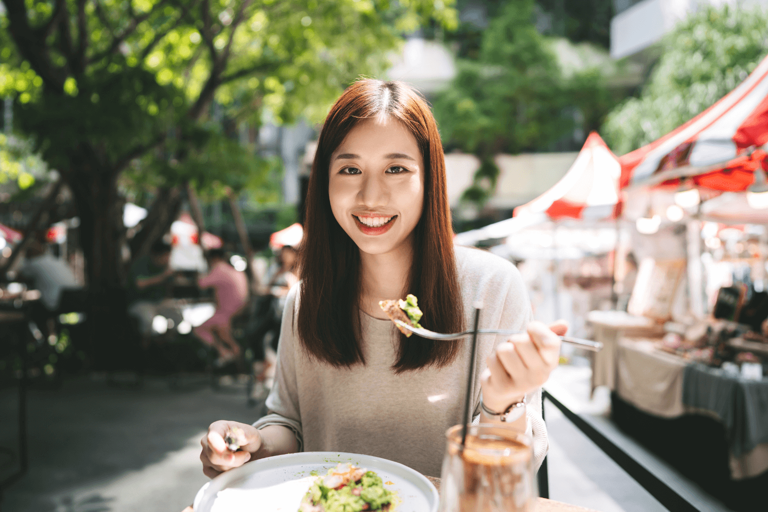 a woman at an outdoor dining