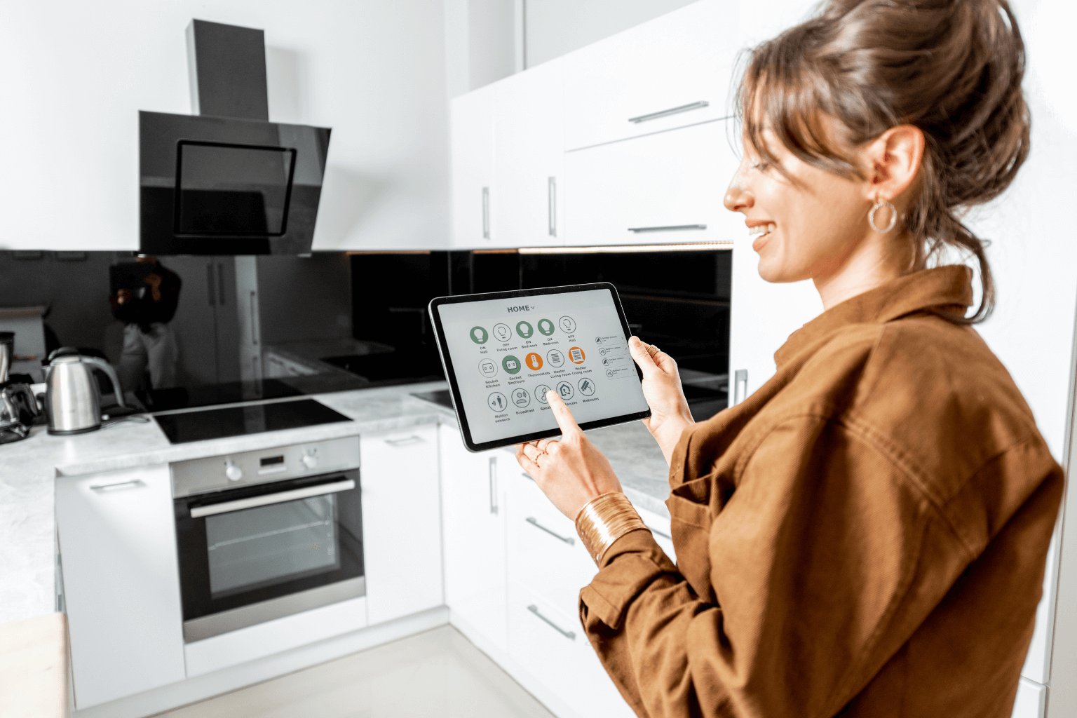 Woman using smart home technology in eco-friendly kitchen