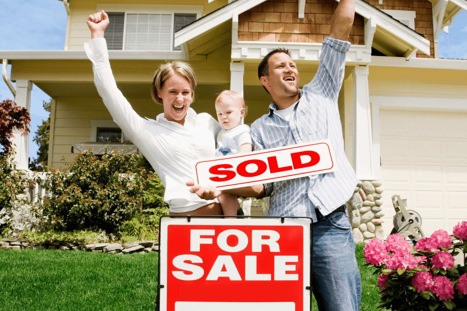 A family standing in front of a new home in Dublin, California