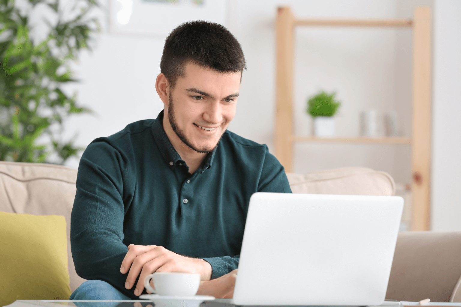 Person using a laptop to search for homes online