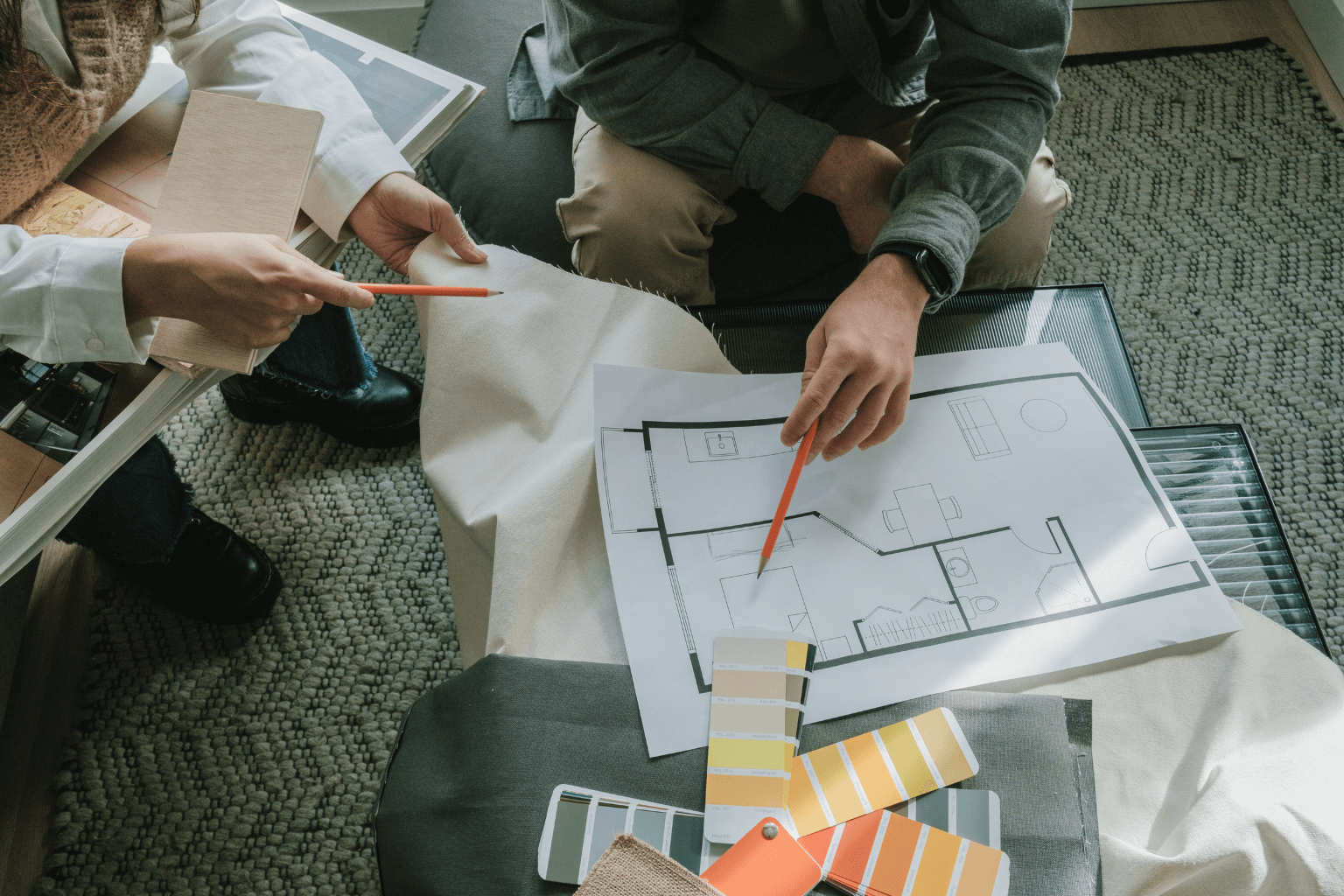 Professional home stager discussing plans with a homeowner
