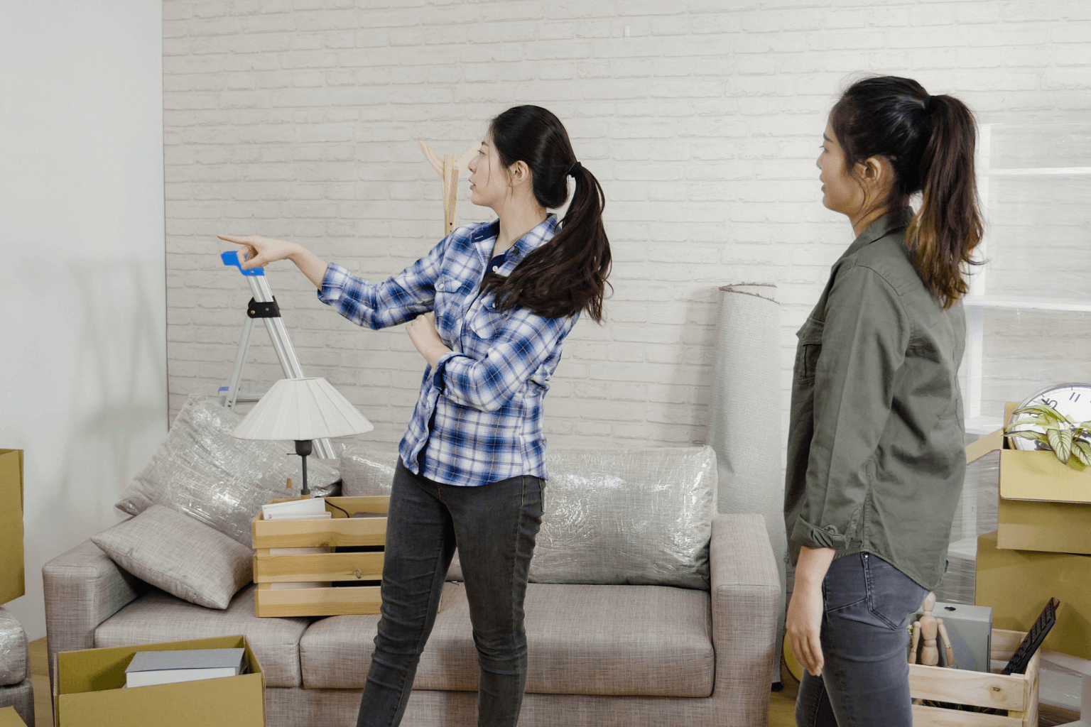 Real estate agent helping a homeowner with home staging