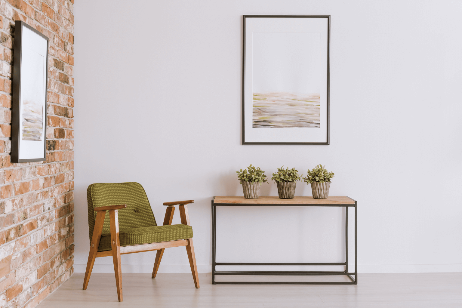 Living room corner with plants, pillows, and neutral furniture