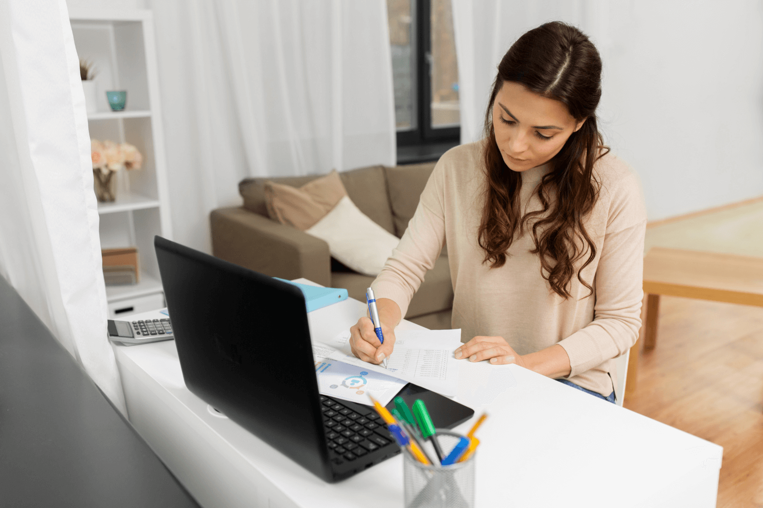  First-time homebuyer reviewing grant or loan paperwork
