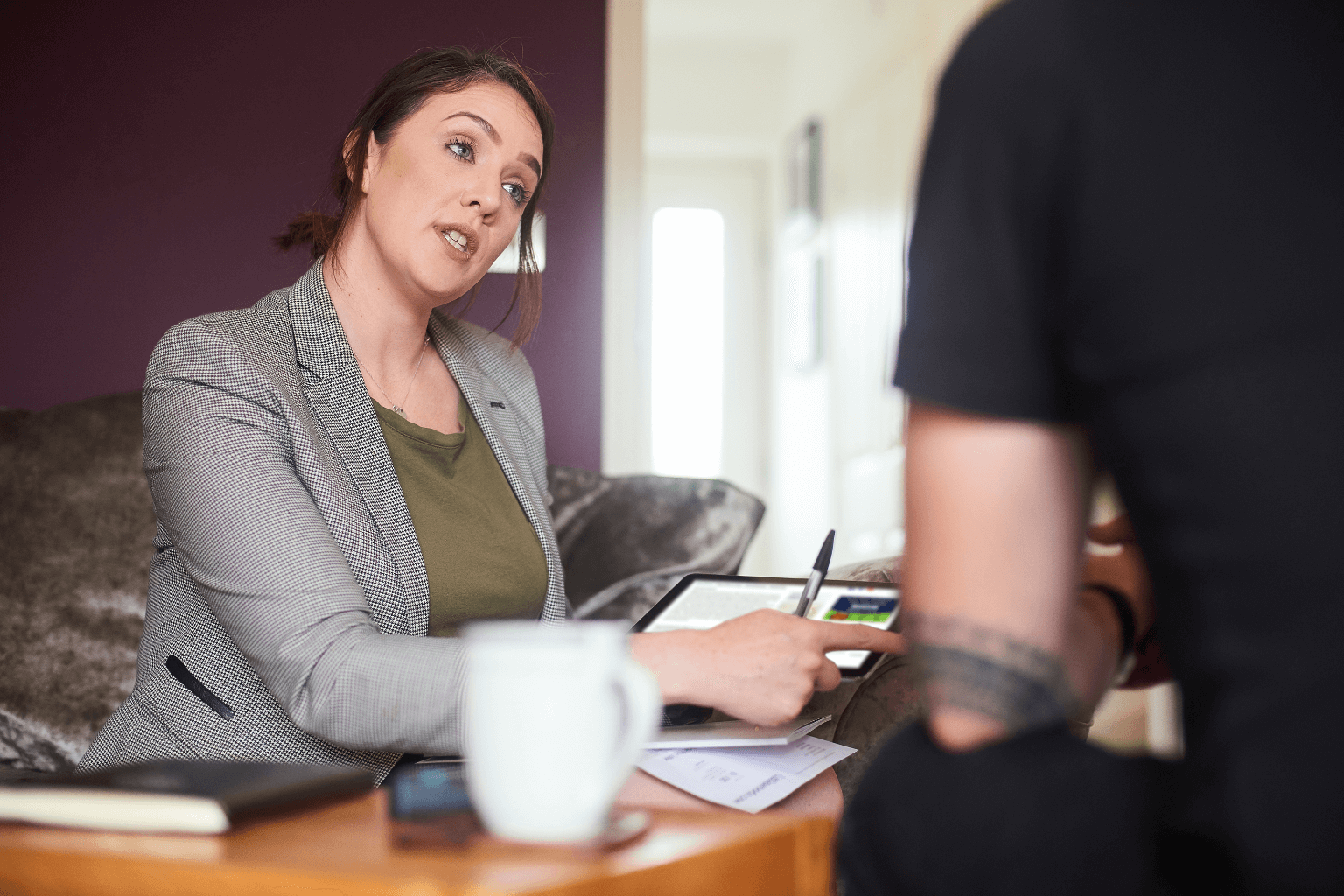 Homebuyers discussing mortgage options with a lender