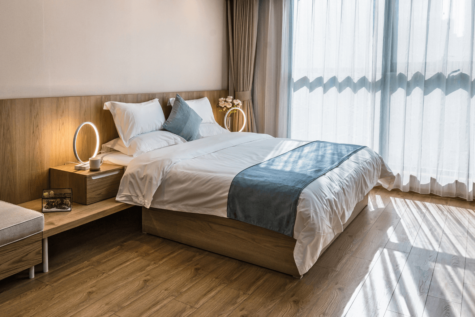 Beautiful staged bedroom with modern decor and natural light