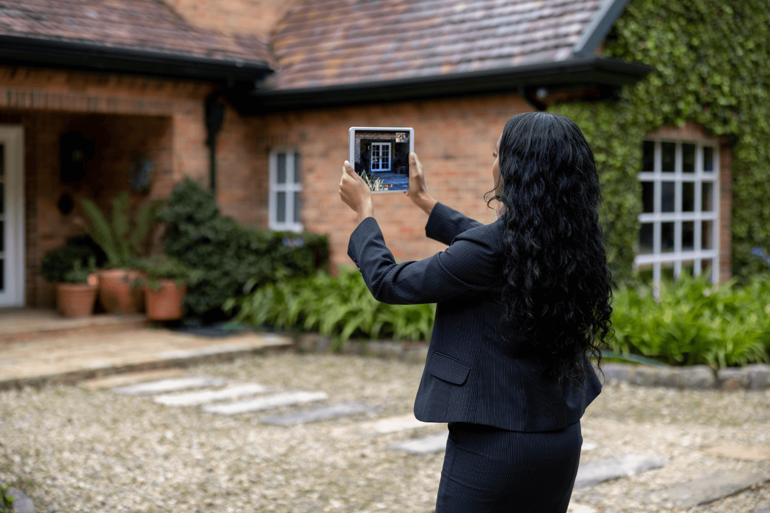 realtor giving a virtual tour on a tablet