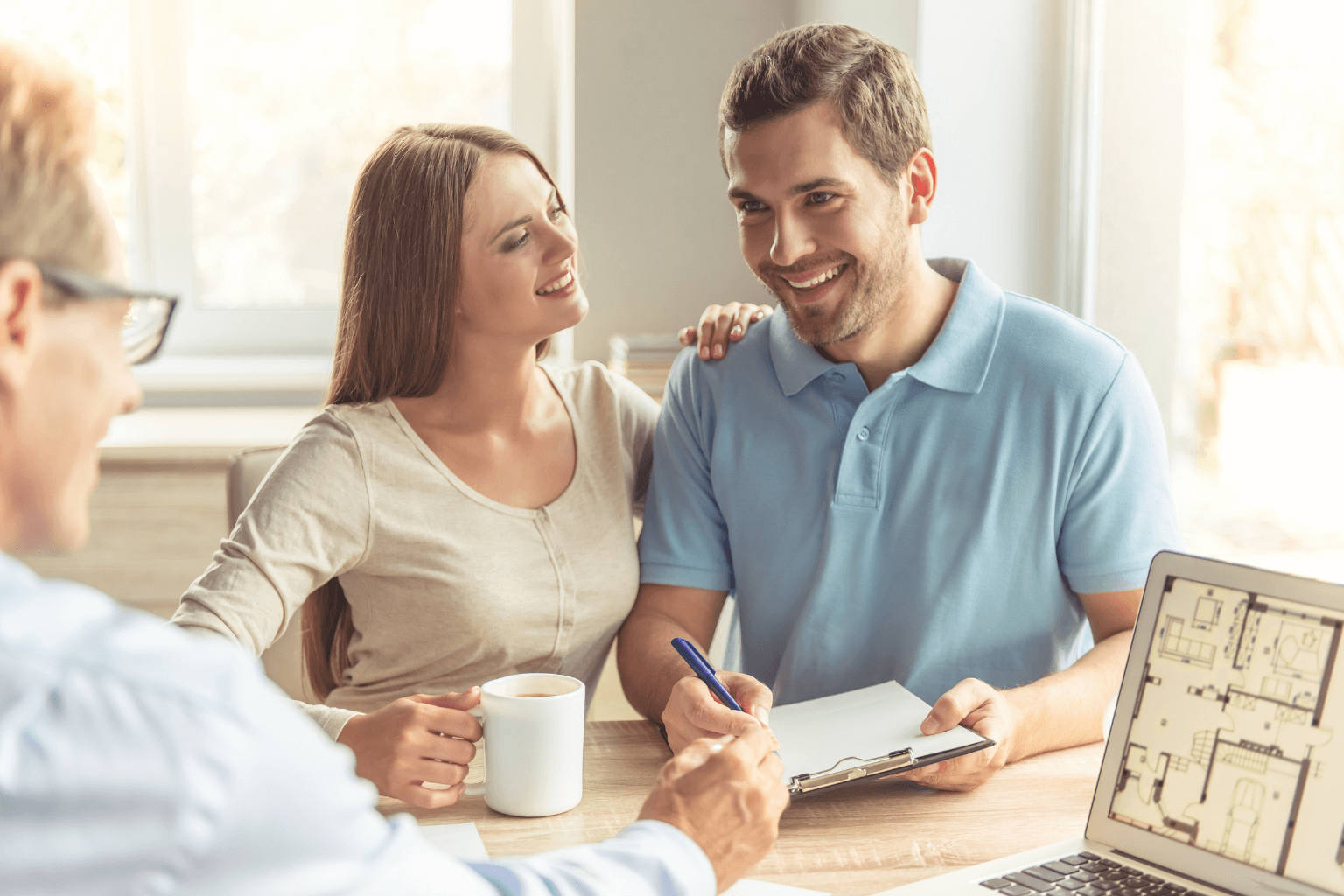 Real estate agent meeting with homeowners in Orinda, CA