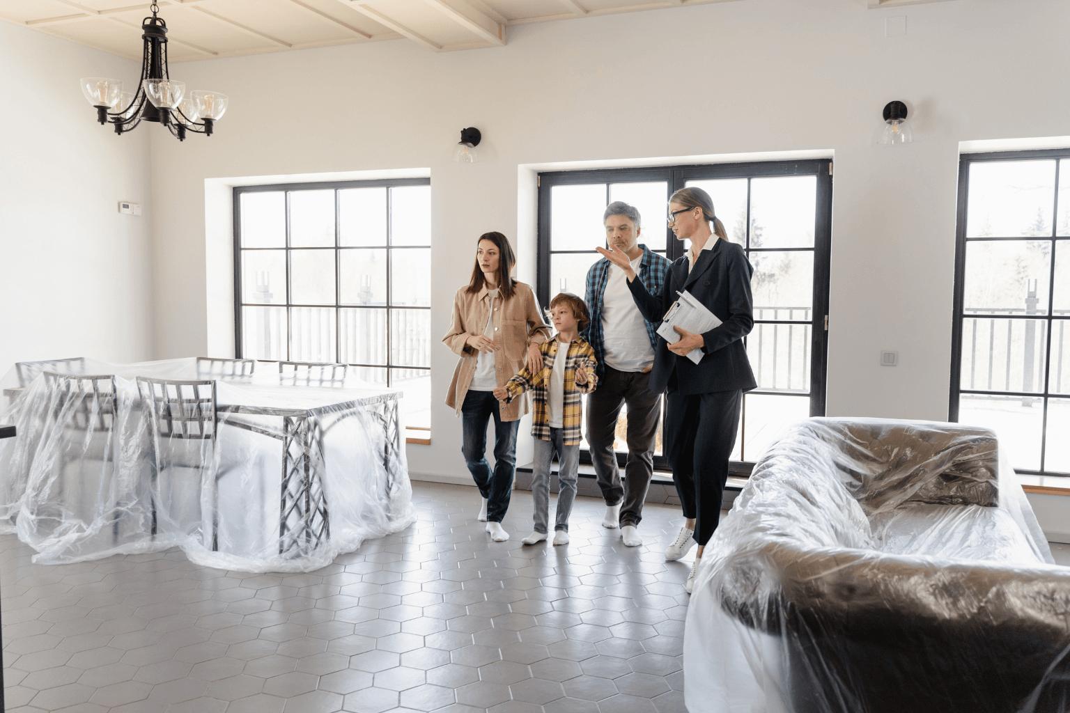 Real estate agent showing a luxury home to potential buyers in Clayton, California
