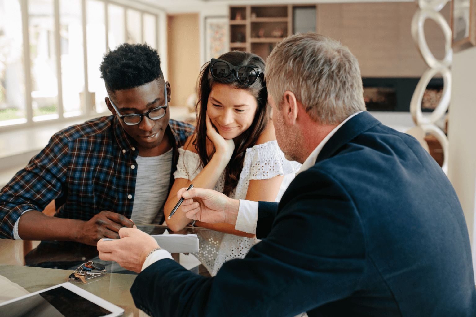 Real estate agent discussing options with homebuyers