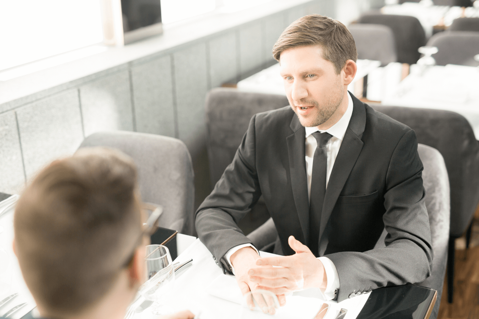 Buyer asking questions to a real estate agent