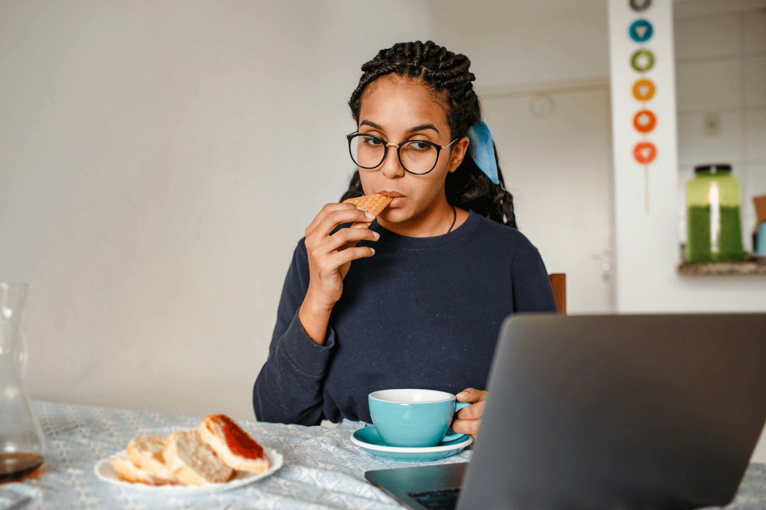 Breakfast with coffee and notepad on a kitchen table