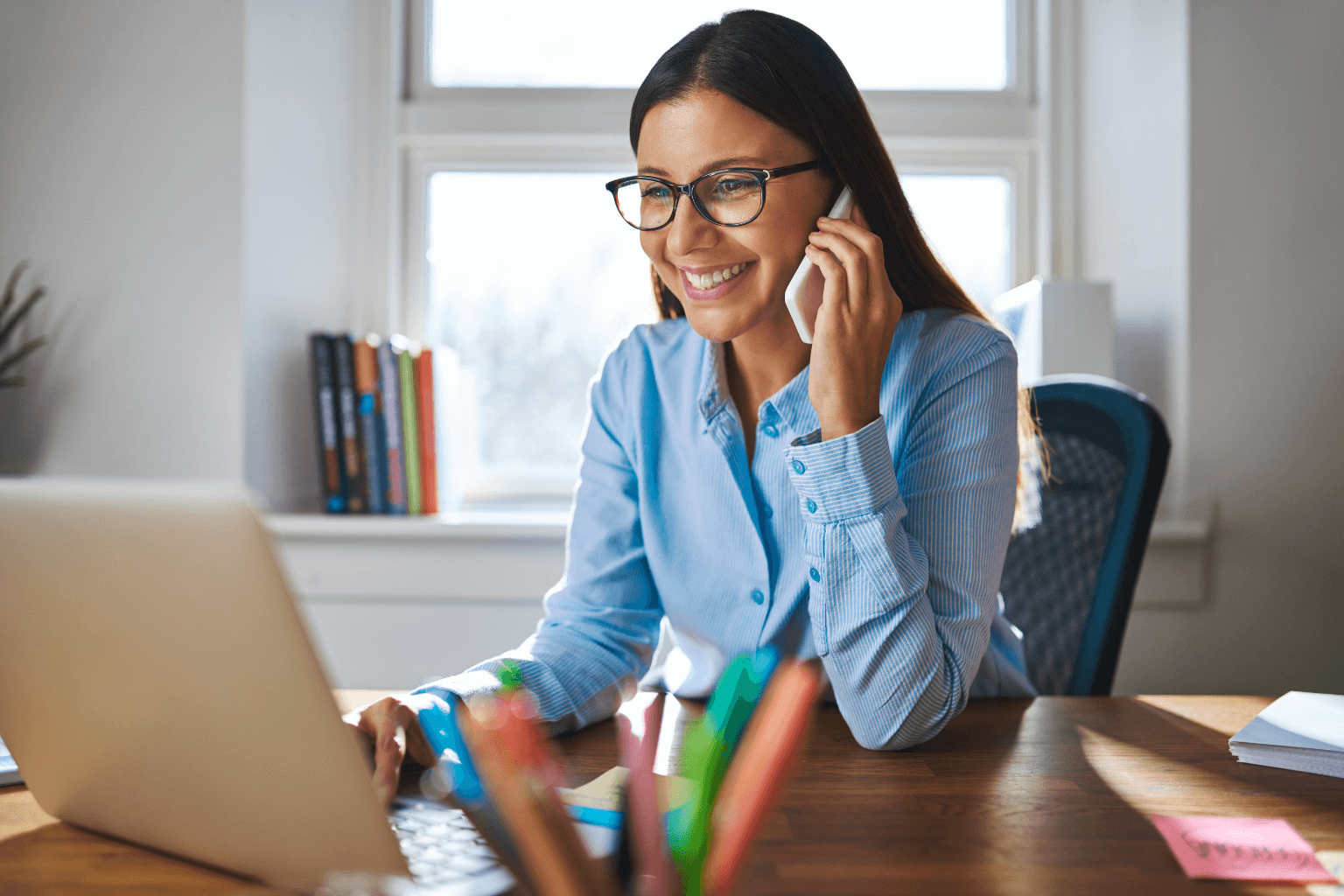 Realtor making cold calls in a modern office setting