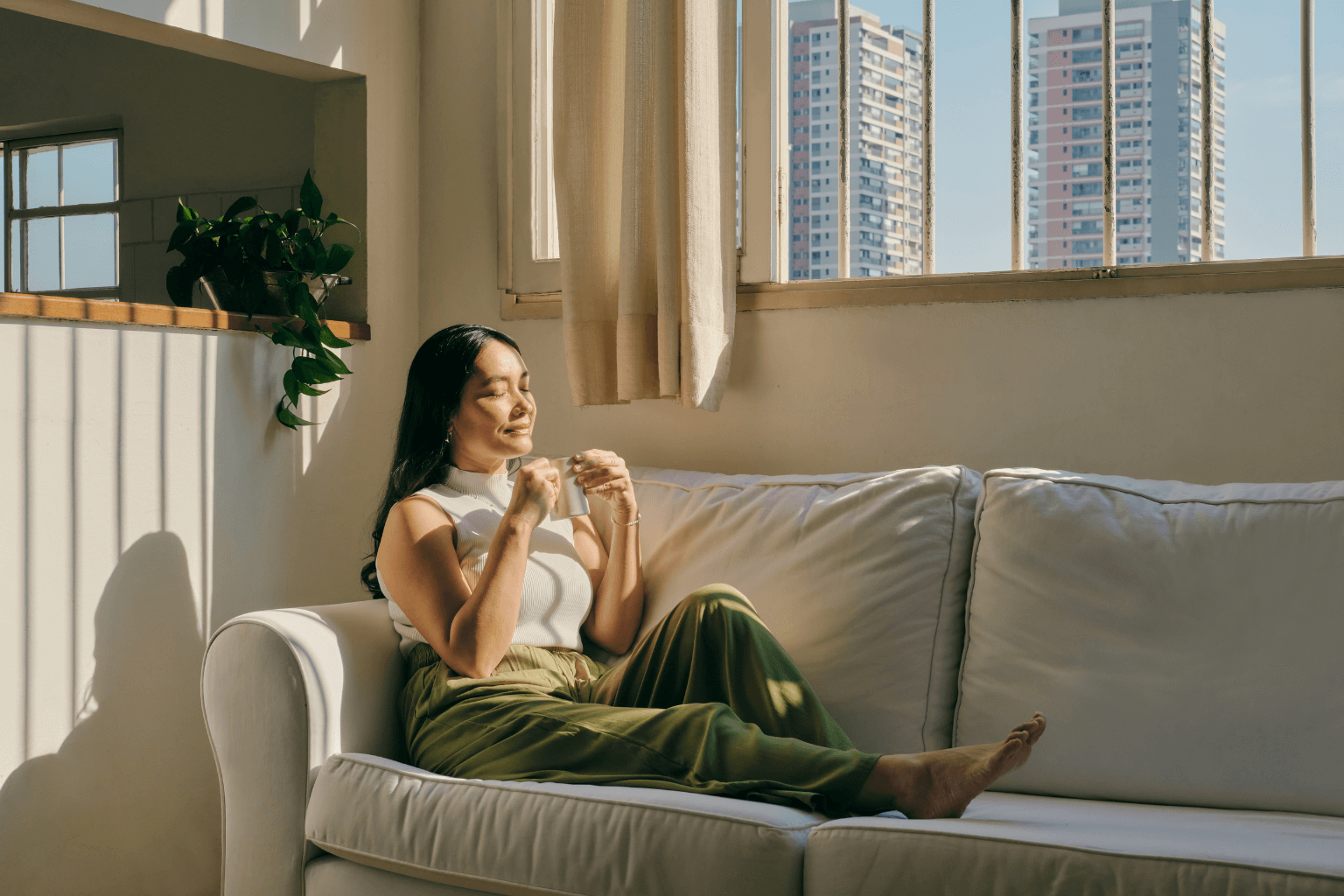 Real estate agent relaxing during a break with coffee
