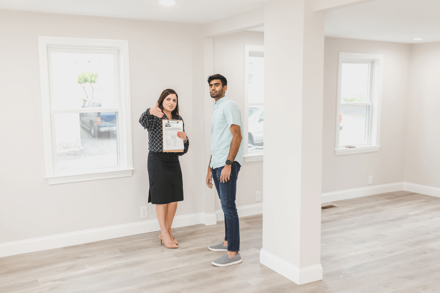 Realtors touring a modern property together
