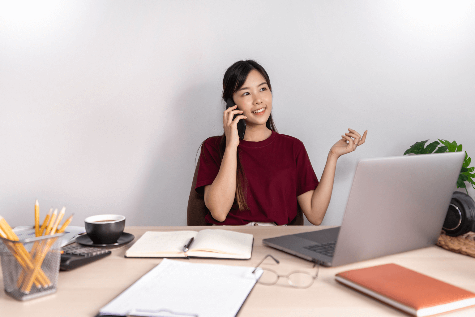 Realtor generating leads on laptop and phone