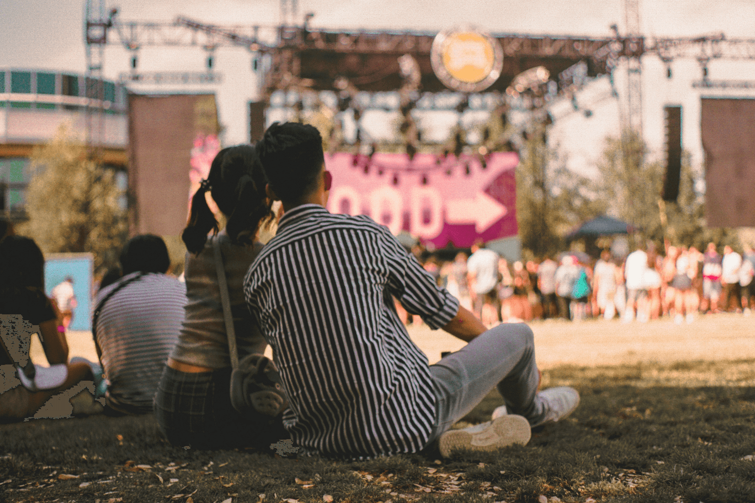 People enjoying a summer concert in a park in Dublin California