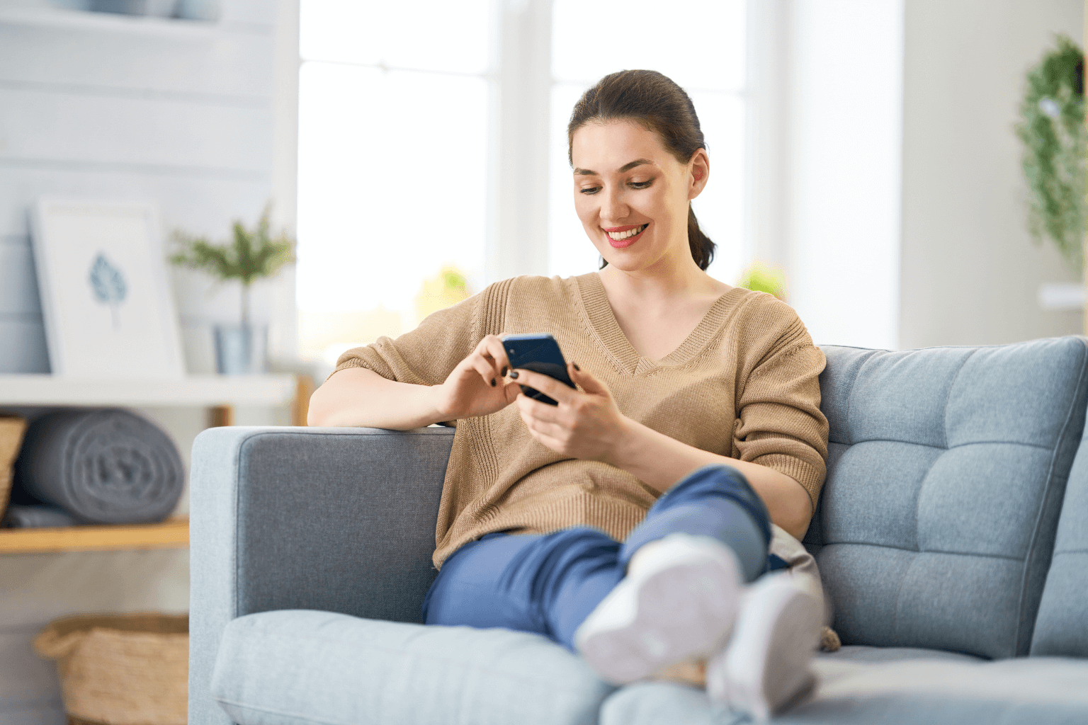 Person using a smartphone to review home buying documents