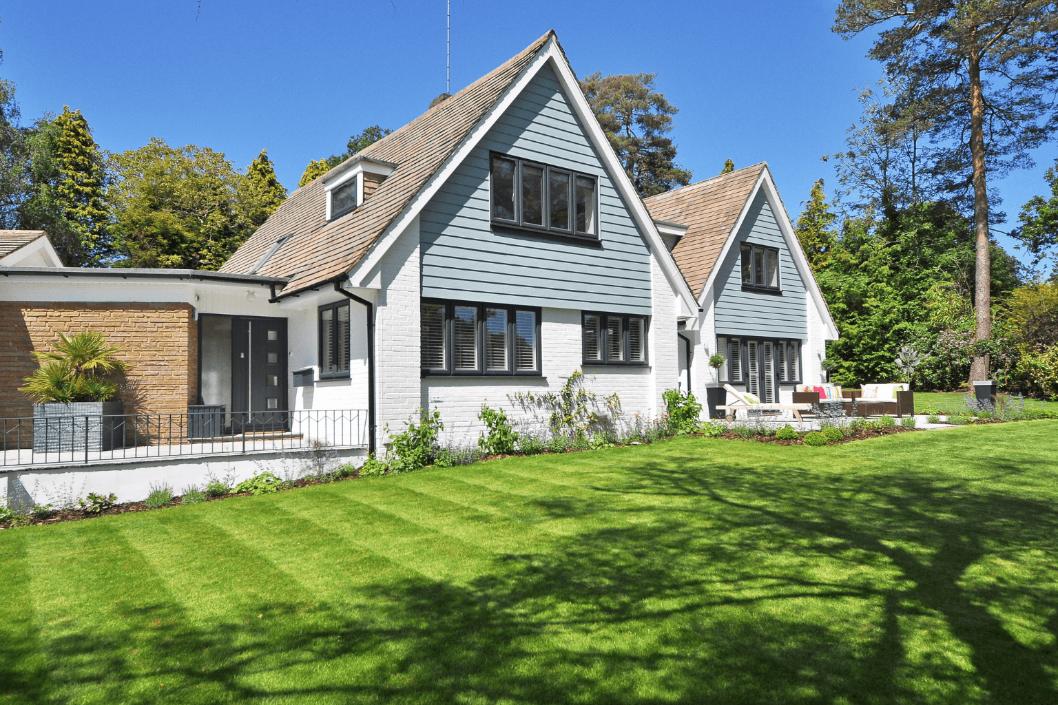 Beautiful exterior of a Danville-style home with landscaped yard