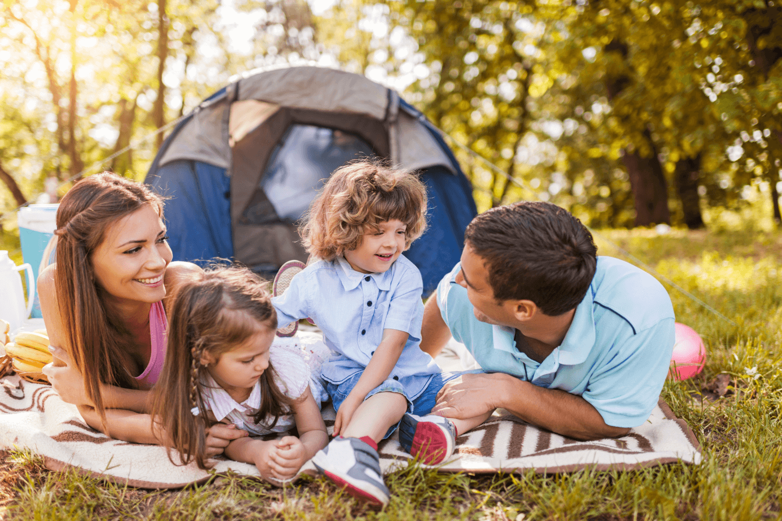 Families camping at a summer event in Moreaga