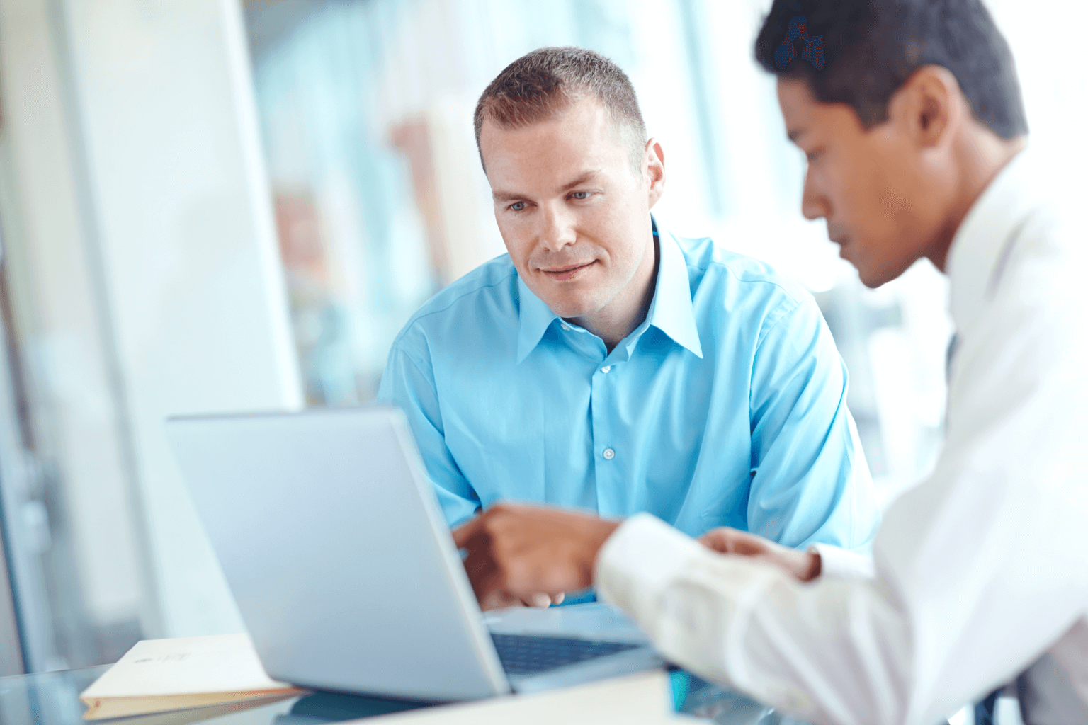 Homeowners discussing selling options with a real estate agent