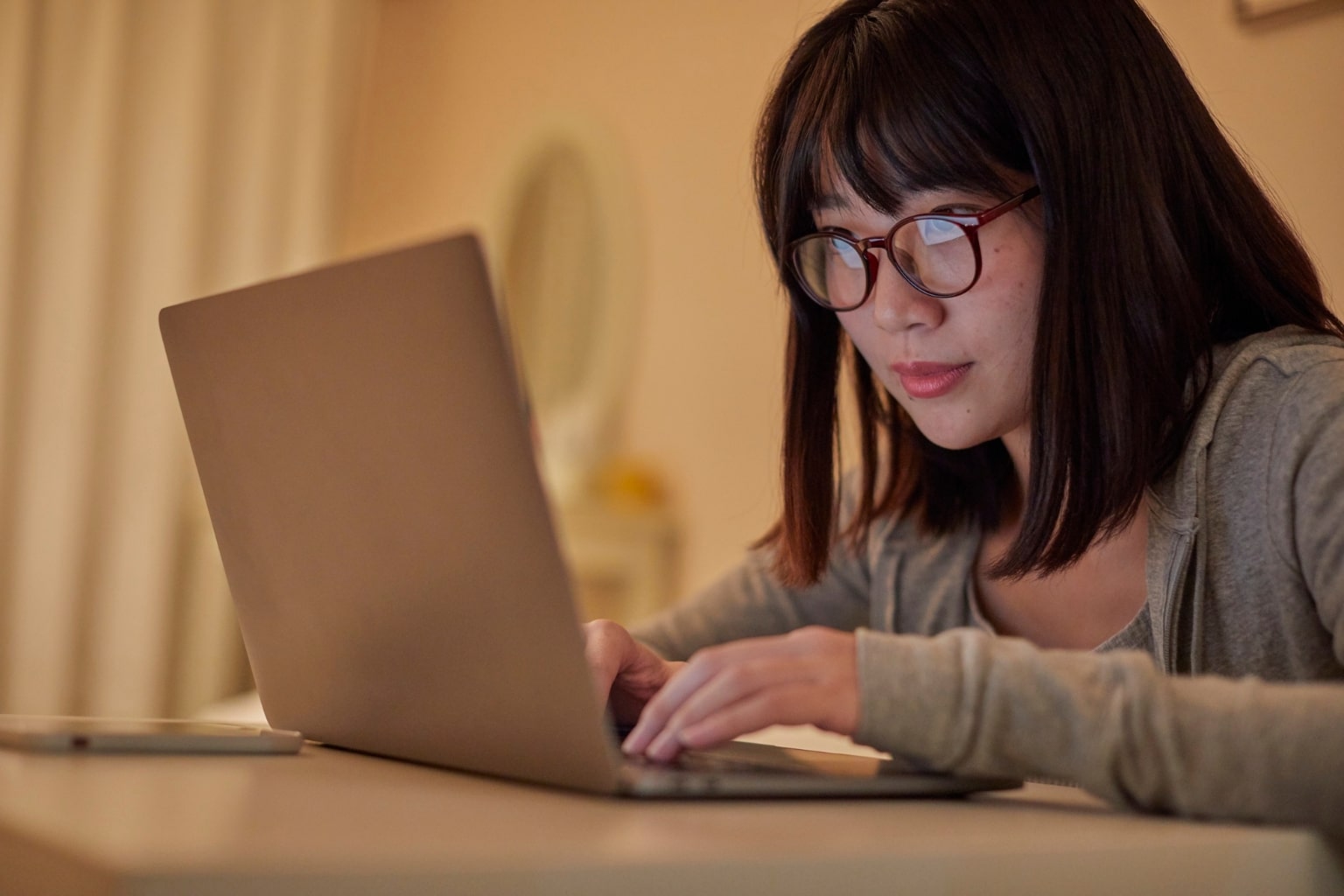 Person researching real estate agents online for homes in Orinda California