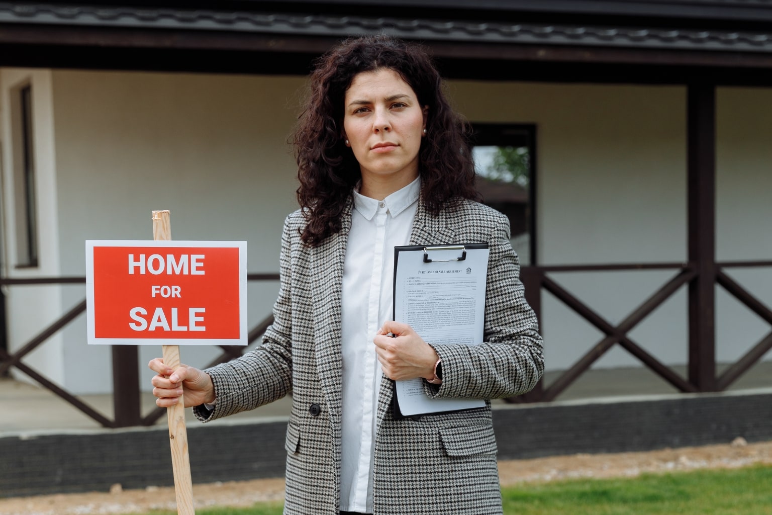 Questions to ask before hiring an agent in Lafayette: Real estate agent marketing a home for sale