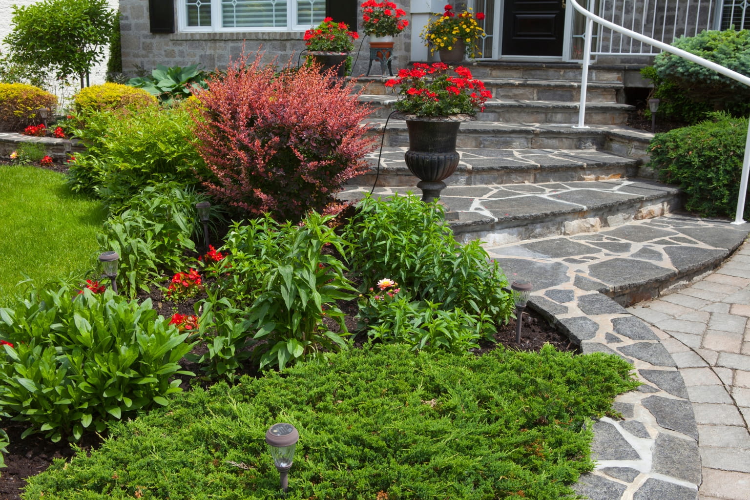 Fresh landscaping and clean front entrance | How to Prepare Your Home for Spring Selling Season