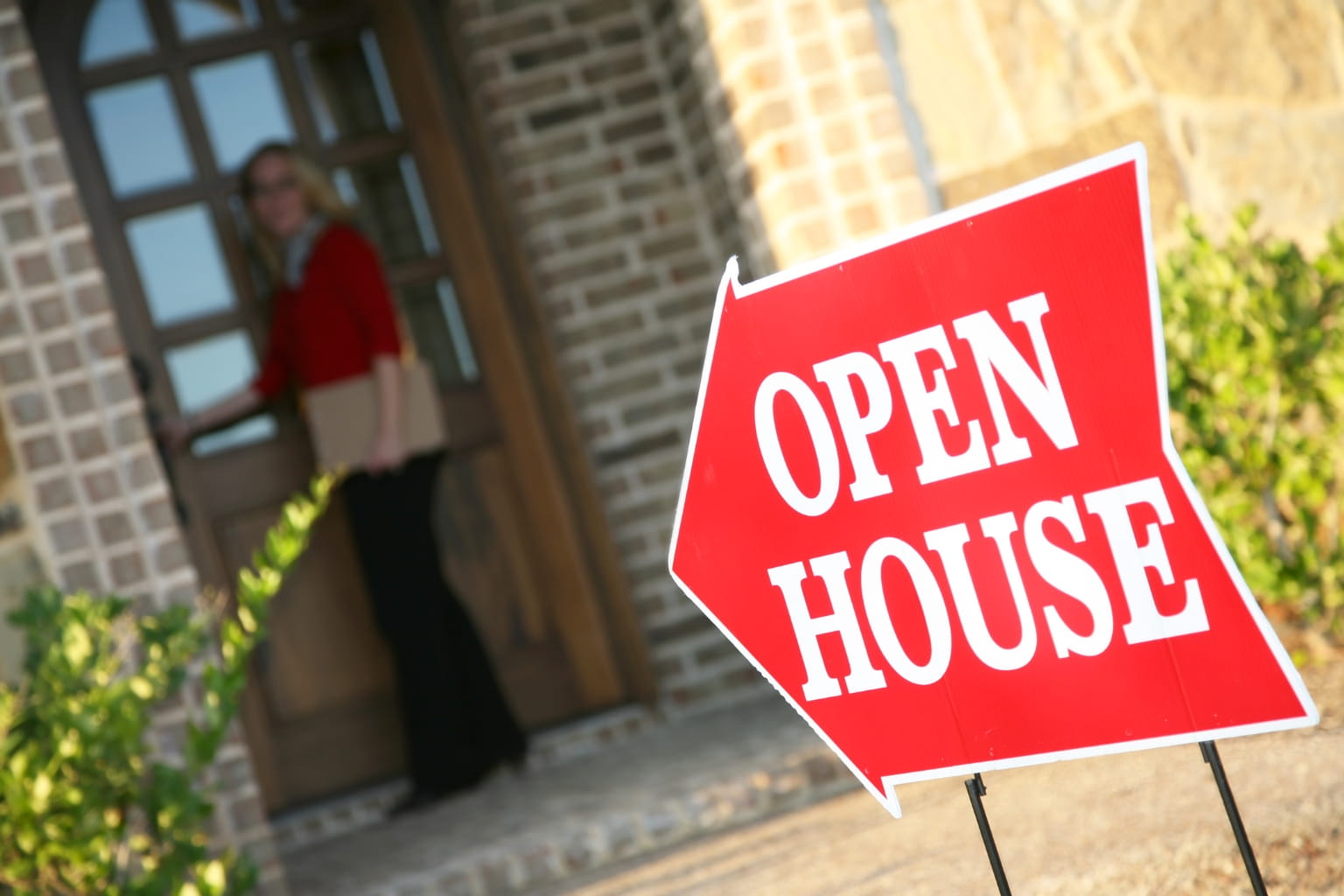 Buyer visiting home during a spring open house | How to Prepare Your Home for Spring Selling Season