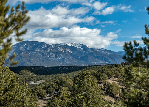 Arroyo Hondo, NM real estate with mountain views of the Sangre de Cristo Mountains and forested foothills near Taos.
