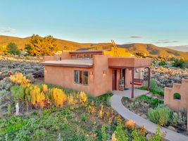1417 Santa Cruz Road Taos NM Mountain View Trees Studio Exterior Dusk