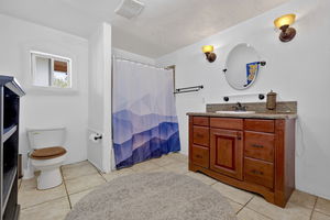 32 Valerio Road Bathroom with Wood Vanity