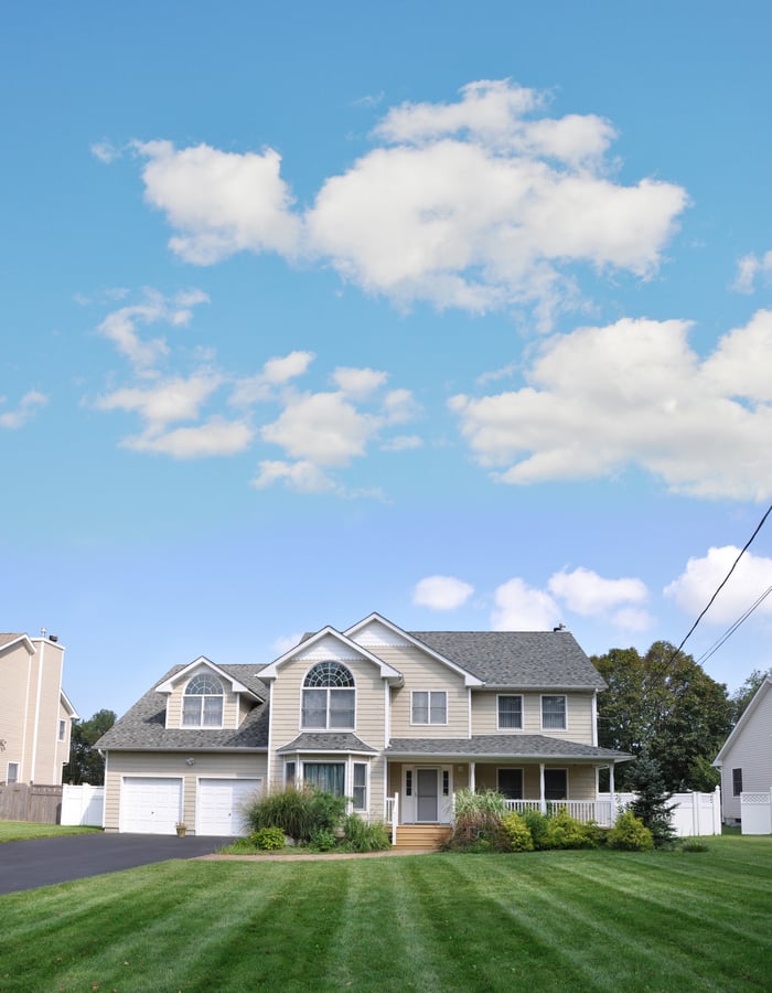 Suburban,Two,Car,Garage,Two,Story,Home,Green,Lawn,Blue