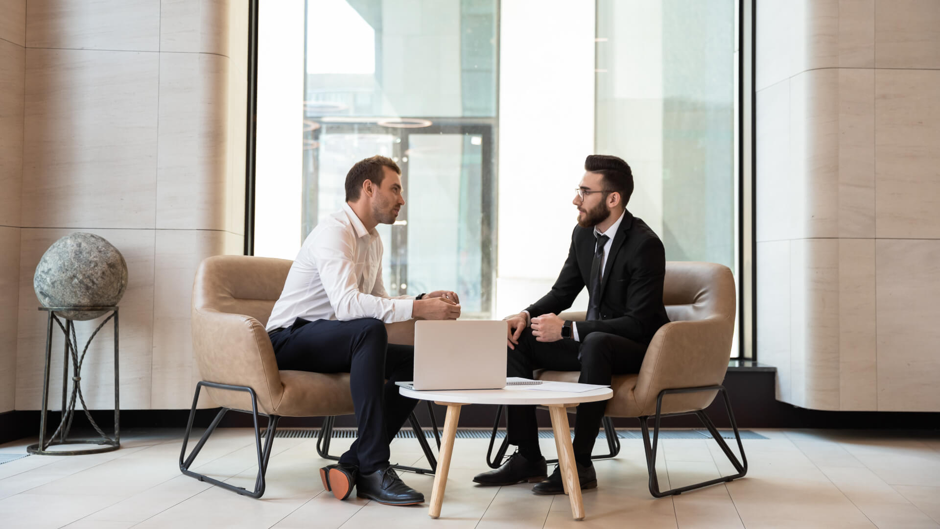 business partners negotiations or job interview in modern office