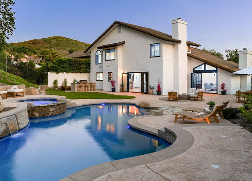 Modern luxury house with a swimming pool and patio